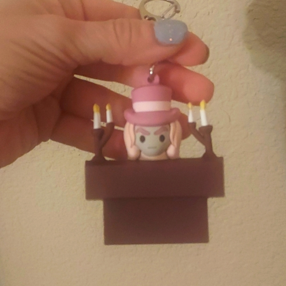 Disney haunted mansion organ player keychain